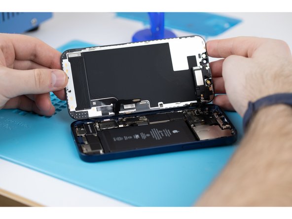 Pull the display assembly away from the phone.