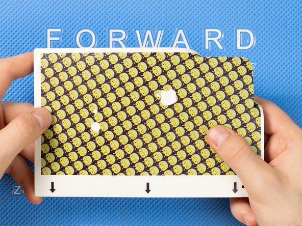 Peel away the back cover from the film.