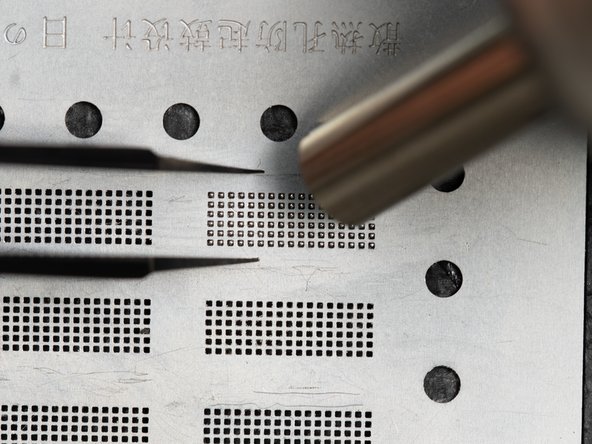 When you move the nozzle across the stencil you'll see the paste change colour which means the solder balls are forming.