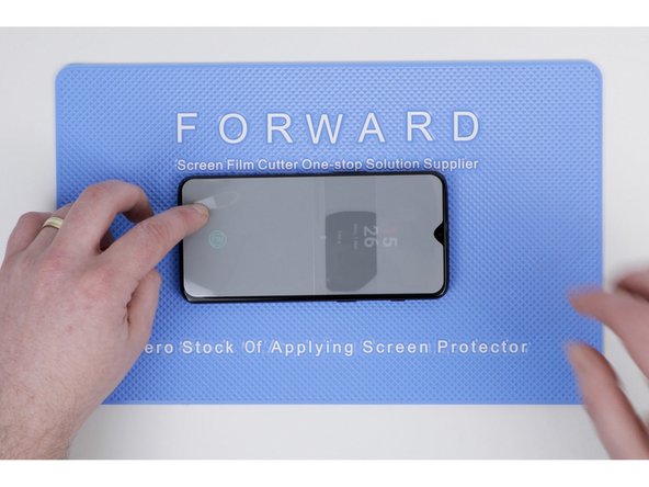 Clean your phone thoroughly of any grease or dust with screen cleaner and a cleaning cloth.