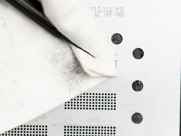 If all of the holes are filled in, clean the stencil with a cloth to get rid of any solder paste residue. Cleaning it also helps push the solder paste around the small holes in the stencil. This helps it sit in the right place, you may want to use firm pressure when doing this.