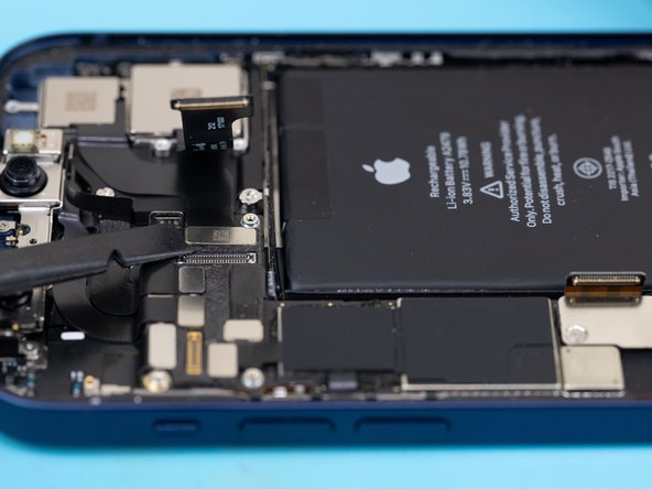 Using a spudger or your fingernail, disconnect the 0.5X rear camera flex from its socket.