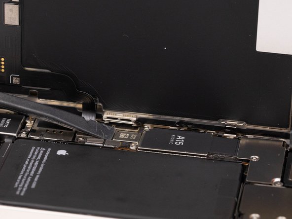 Use a spudger and pry the battery connector up from its socket on the logic board. Make sure your spudger is clean.