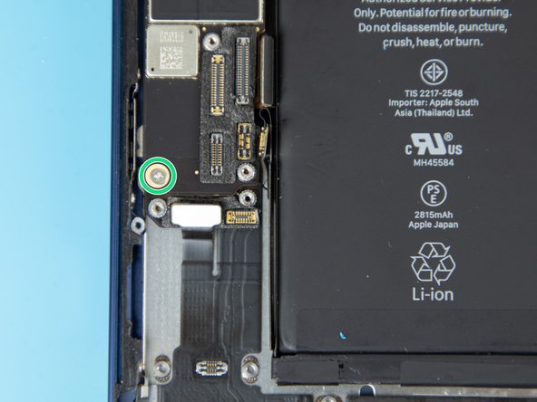 Remove the four screws on the motherboard. There's three screws at the top and one at the bottom. This will allow you to remove the motherboard.