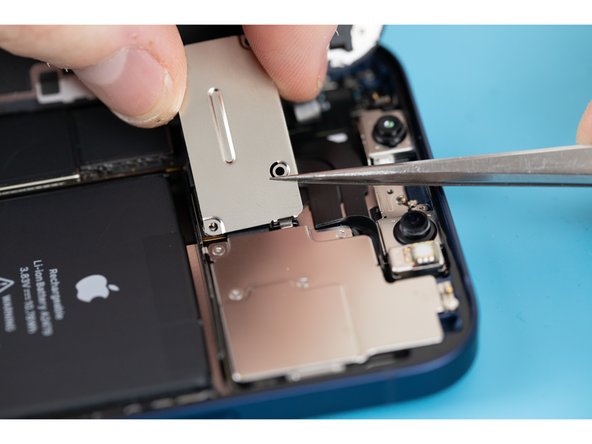 One 1.4mm long screw.