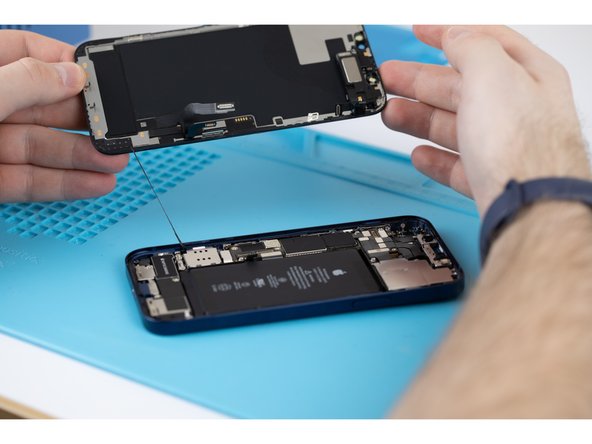 Pull the display assembly away from the phone.