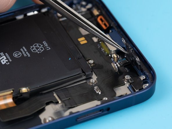 Remove the plastic bracket holding the microphones down.