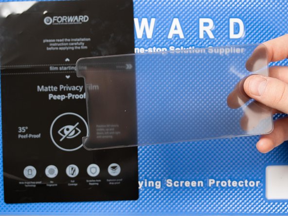 Peel off the cut from the backing sheet. Bending the sheet will help peel the cut off.