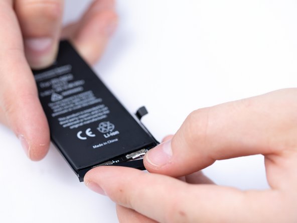 Put the plastic protective bracket into place.