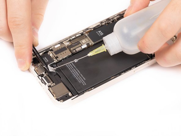 Hold the iPhone by it's sides rather than pressing on the battery.