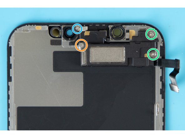 Unscrew the four screws holding the speaker/sensor assembly down. There are three different types of screws you'll need to remove.