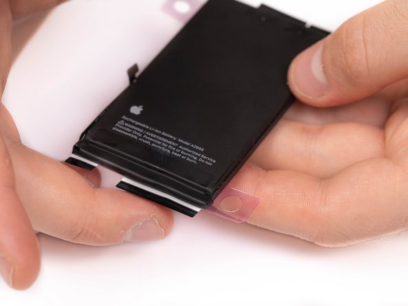 Using your finger, fold the four black tabs into place. Do this for every black tab.