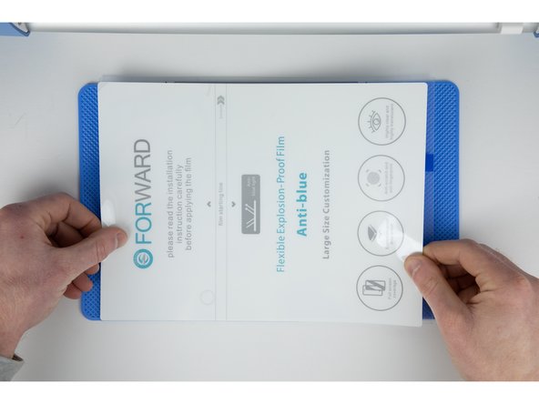 Try and get your film lined up as accurately as you can and stick it down.