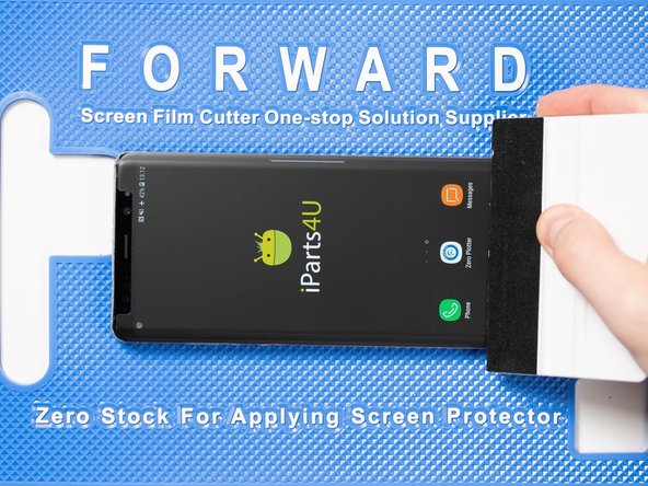 Run your application tool across the entire front film one last time to smoothe out any bubbles and ensure it's fully stuck down.