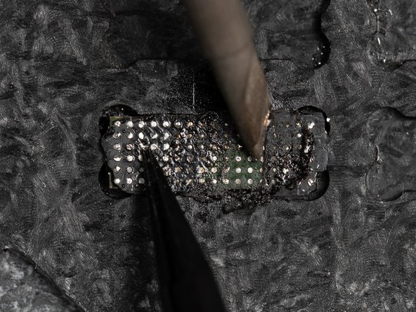 When moving out towards the edges of the IC, use tweezers to hold the chip in place so it doesn't pop out of the reballing platform.