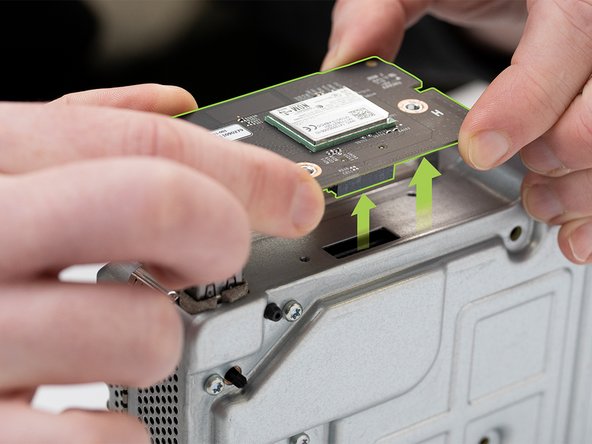 Pull the Bluetooth board straight out to disconnect it from the chassis.