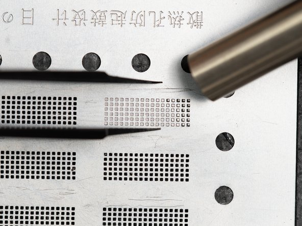 When you move the nozzle across the stencil you'll see the paste change colour which means the solder balls are forming.