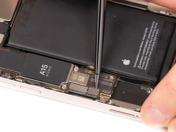 Disconnect the first charge port flex from it's socket.