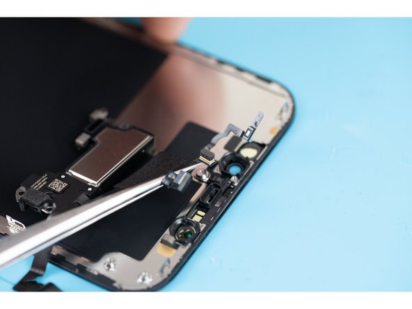 Once lifted away you can remove the earpiece speaker and front sensor assembly.