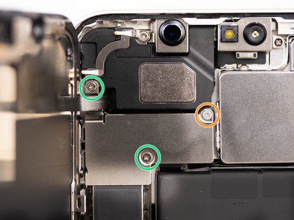 Remove the three screws holding the connector cover in place.