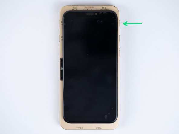 Flip your screen so it sits on top of the tester. Be mindful of your flex cables when doing this.