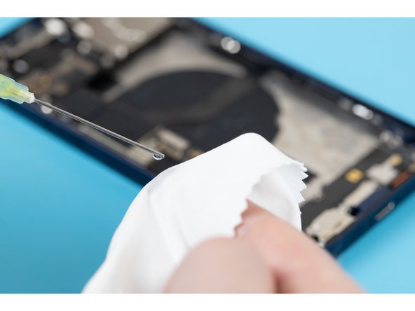 Apply the IPA to a clean cloth and wipe down the inside of the phone where the battery had previously been sat.