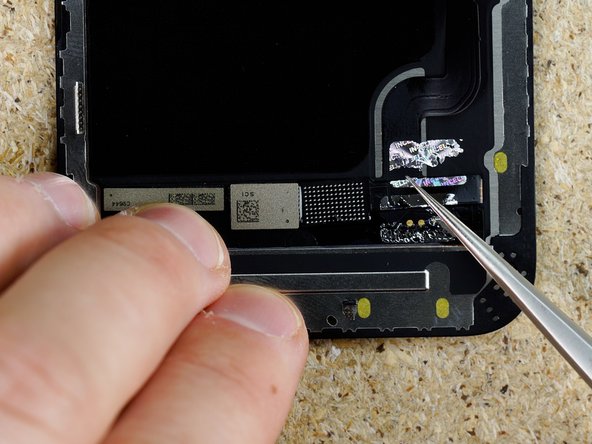 Using IPA &amp; tweezers pry the flex away from the display.