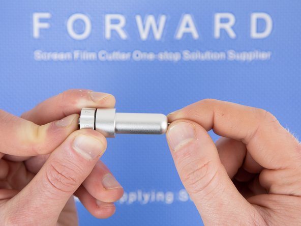 Remove the blade from the blade holder by pulling it out slowly.