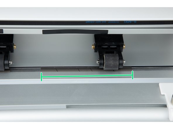 The reason for moving the wheel outward is so all 3 wheels are able to cover the entire length of the 13 inch film.