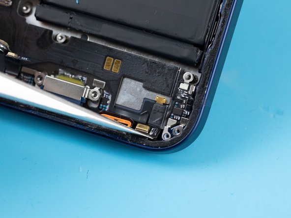 Using a tweezer, remove the microphone from it's socket.