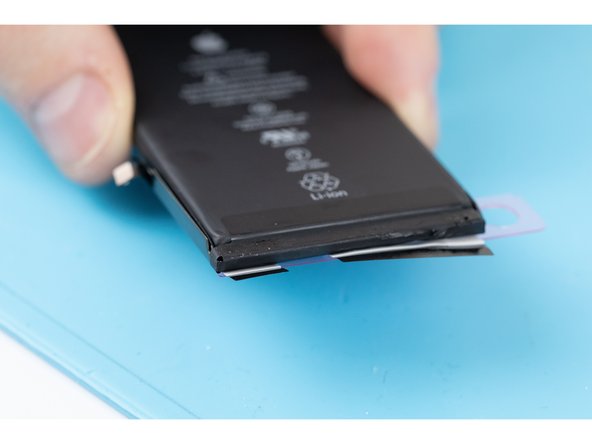 Using your finger, press the black tabs into place. Do this for every black tab.