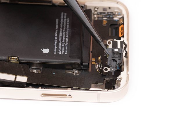 Remove the plastic bracket holding the microphones down.