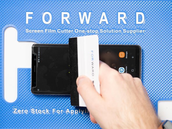 Continue using the application tool to smooth out any bubbles.