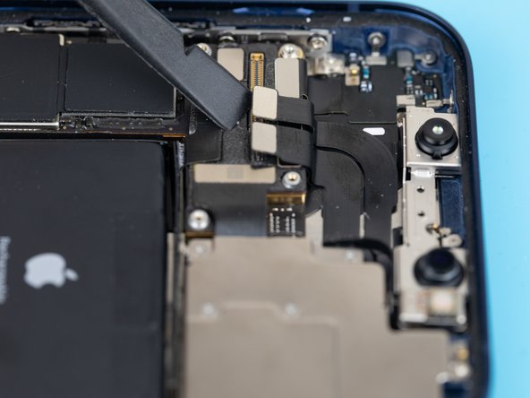 Using a spudger or your fingernail, lift the front-camera flex out from its resting socket on the logic board.