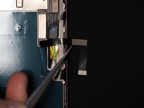 Unfold the section of the flex where you'll be applying the original IC chip.