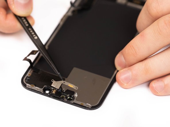 Follow steps 14 to 21 backwards to re-fit the proximity sensor to your new screen.