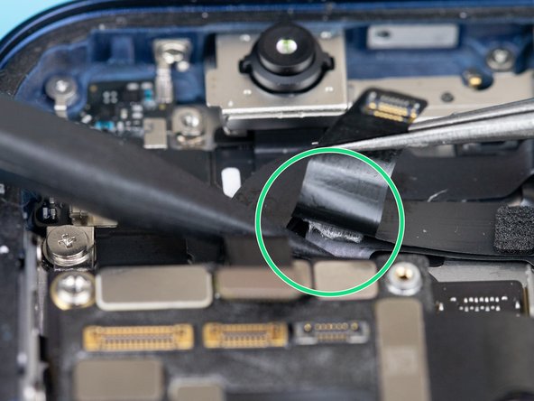 Be cautious when lifting the flex cables as they are glued to the frame. Use a pair of tweezers to slowly lift them away from the frame.