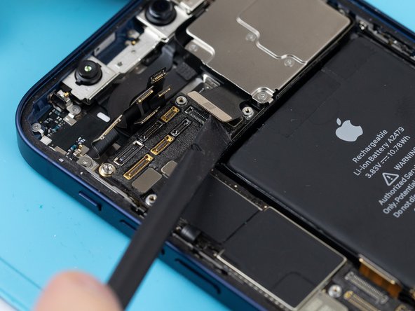 Using a spudger or your fingernail, disconnect the 1x rear camera flex.