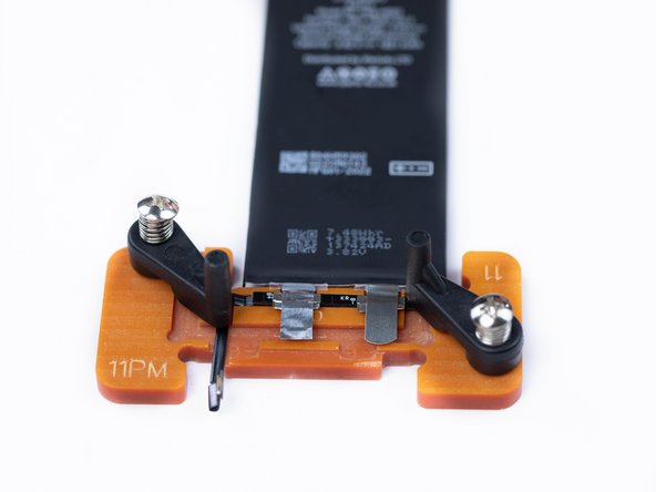 Put the battery plates into the board holder to get an idea of how much you need to cut off of the plates.