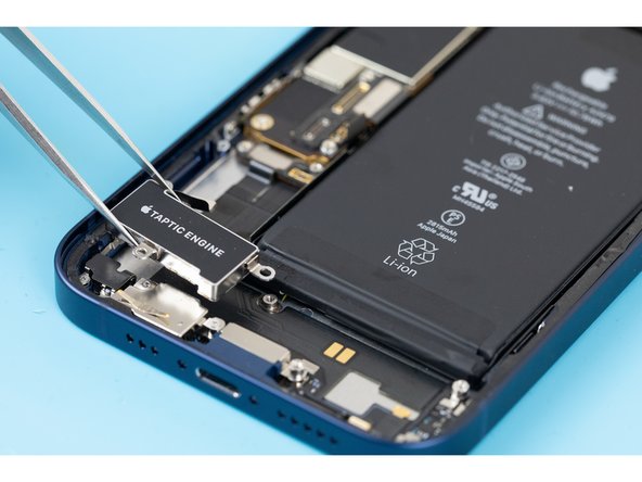 Using tweezers or your fingers, remove the taptic engine.