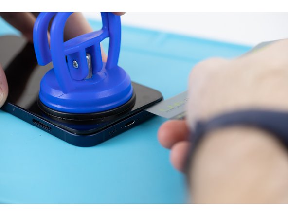 Be careful not to insert your prying tool too far into the phone, a few millimiteres will be enough. You risk damaging the cables connecting the screen if you insert the pry tool too far.