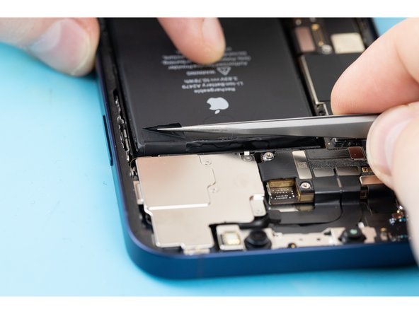 Using the same method as the previous step, remove the remaining adhesive strips.