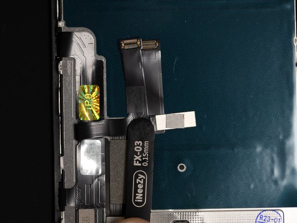 Fold the digitizer flex inwards.