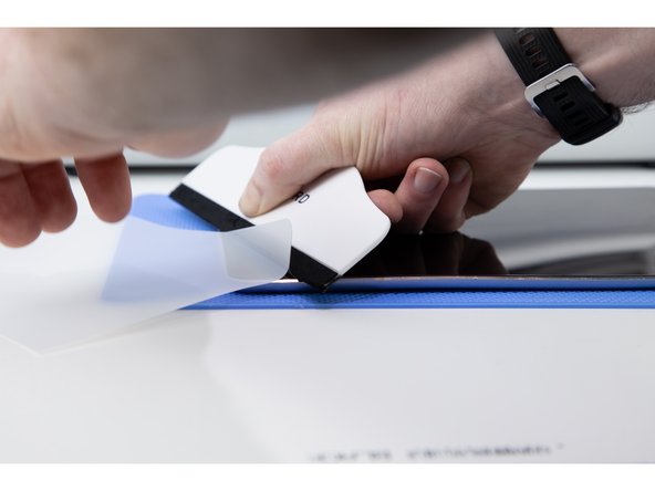 Using the same process as step 18, apply the film to the iPad.