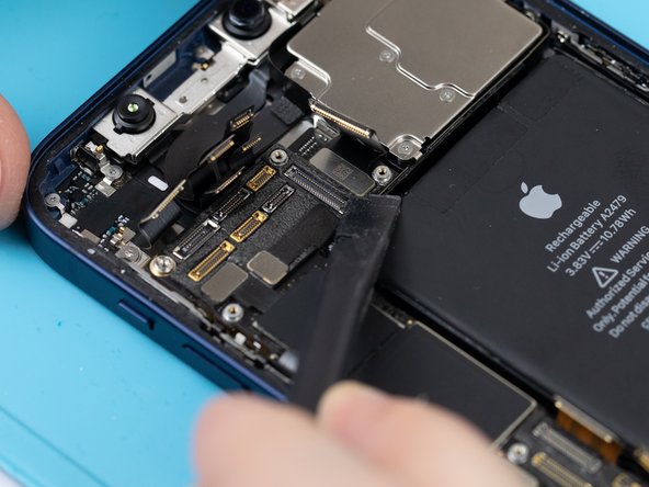 Using a spudger or your fingernail, disconnect the 0.5x rear camera flex.