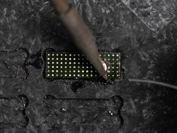 Once the small ball has been created. Rub your solder tip across the board in a back and forth motion