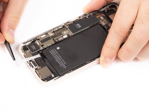 Pull the strip away at a low angle so the strip doesn't snag on the edge of the battery.