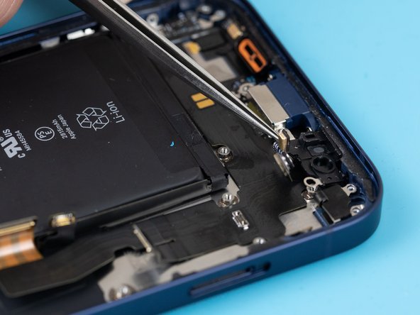 Remove the plastic bracket holding the microphones down.