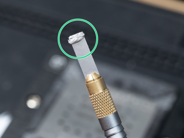 Apply a small amount of solder paste onto the end of your Qianli cleaner. We're using 138°C Solder Paste. Use one of the flat tip connections.