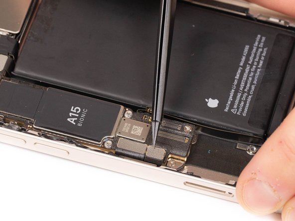 Disconnect the first charge port flex from it's socket.